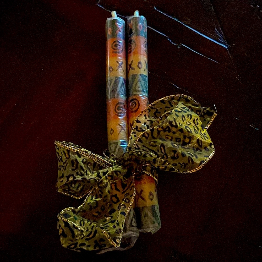 Pair of African inspired taper candles.